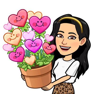 A person holding a pot of flowersDescription automatically generated with low confidence